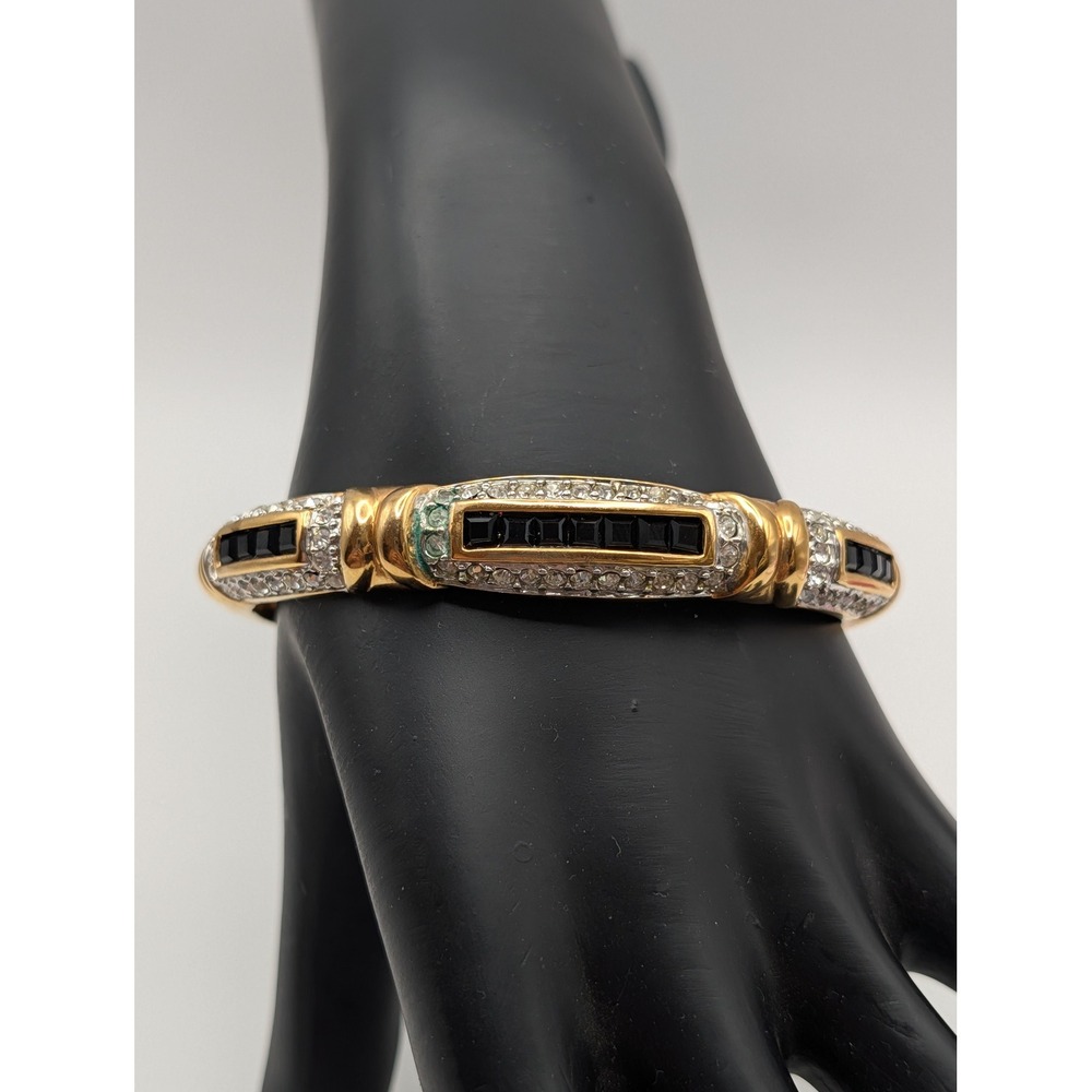 Vintageβ Rhinestone Bangle Bracelet Gold Tone Hinged Black Accent Stones